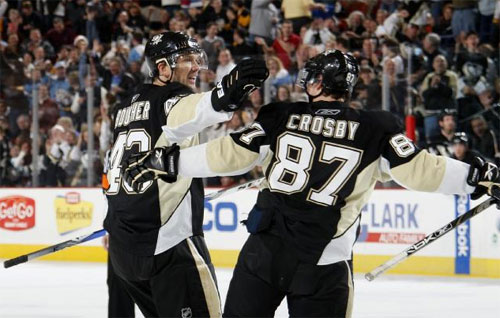 Philippe Boucher and Sidney Crosby celebrate after defeating the Islanders