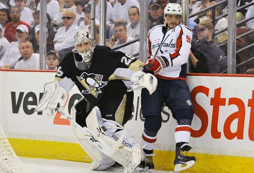 Marc-Andre Fleury plays the puck against the Capitals on 5/6/09