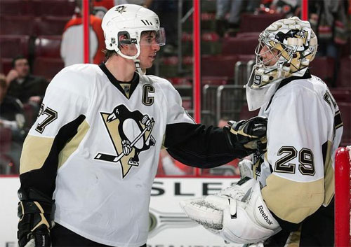Marc-Andre Fleury and Sidney Crosby have a chat after Flower made a big save on the Flyers
