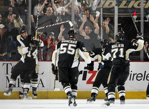The Penguins celebrate Bill Guerin's Overtime goal on 4/18/09