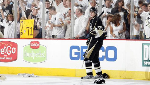 Evgeni Malkin celebrates his hat trick against the Hurricanes on 5/21/09