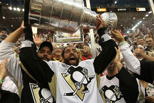 Max Talbot raises the cup in jubilation