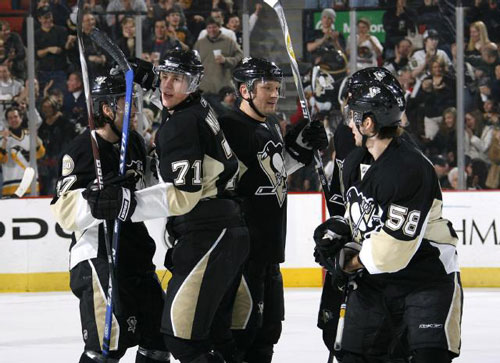 Evgeni Malkin of the Pittsburgh Penguins celebrates his first period goal with Petr Sykora, Sergei Gonchar, and Kris Letang against the Los Angeles Kings on February 9, 2008 at Mellon Arena. The Penguins won 4-2.